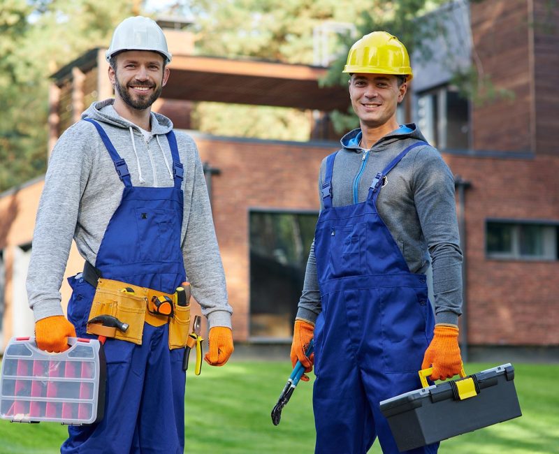 two-positive-handsome-young-male-engineers-in-hard-resize.jpg